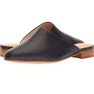 Black leather Clarks mules